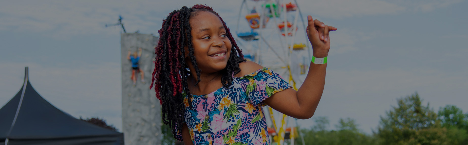 Employee event attendee enjoying circus activities